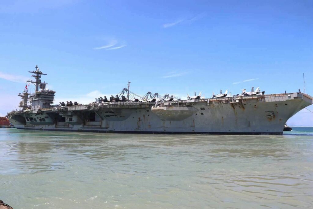 The USS Abraham Lincoln in War and Repose